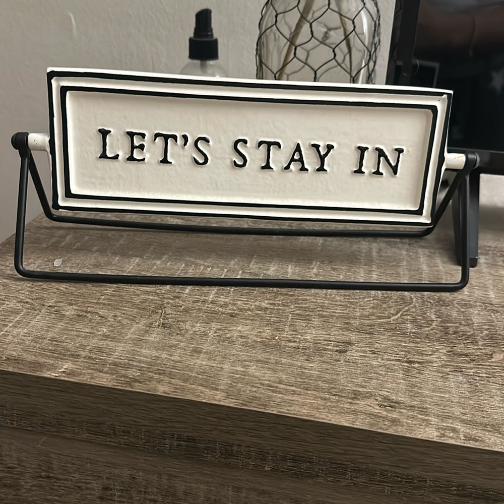 Stay in/go out sign